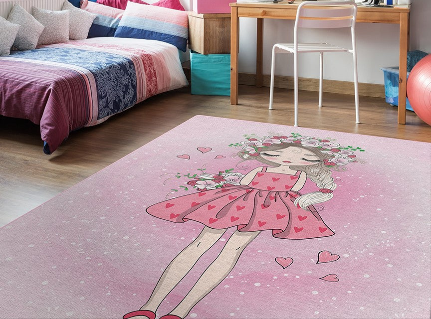 Alfombra 'Corazón' situada en la habitación de una niña, transformando el espacio en un rincón lleno de encanto y fantasía. Su diseño con patrones intrincados y colores vibrantes como fondo para juegos, lectura y descanso, hace de la habitación un lugar perfecto para el desarrollo y la diversión infantil. Lavable en lavadora, base antideslizante, sin pelusas e hipoalergénica, ideal para cualquier espacio infantil.