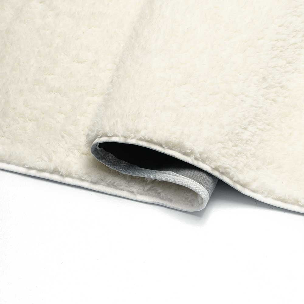 Tapis à poils longs beige