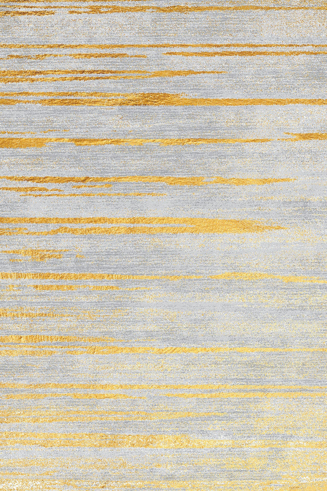 Alfombra 'Luxora' sobre un fondo blanco, resaltando su elegante diseño en tonos dorados y grises. Perfecta para añadir un toque de sofisticación, esta alfombra es también lavable en lavadora para una mayor comodidad.