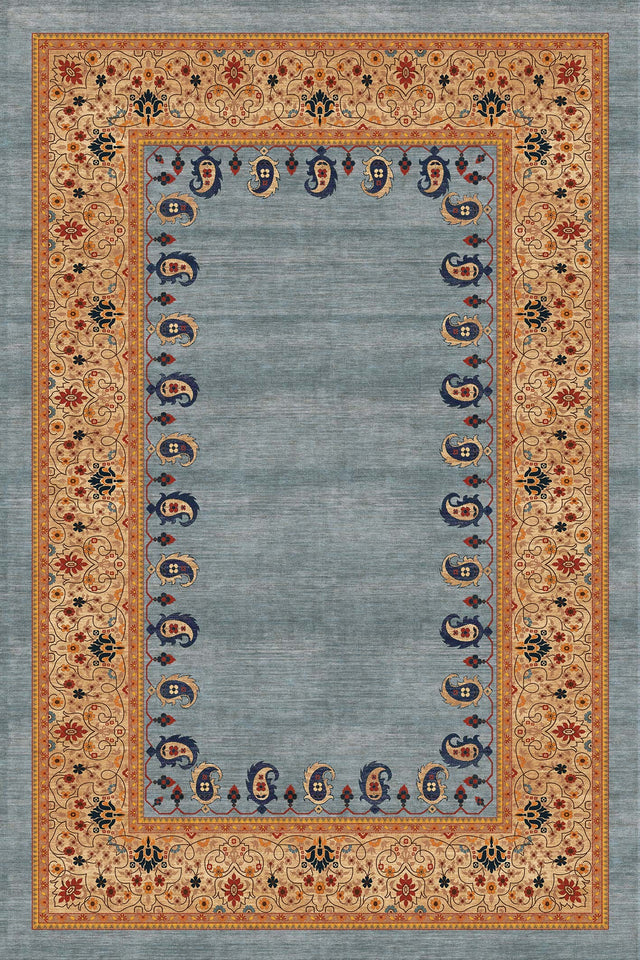 Alfombra exclusiva 'Cachemir' sobre un fondo blanco, mostrando su diseño ornamentado con patrones florales y de cachemira en tonos de naranja, beige y azul sobre un fondo gris. Ideal para añadir distinción y calidez a cualquier espacio. Lavable en lavadora, base antideslizante, sin pelusas e hipoalergénica.