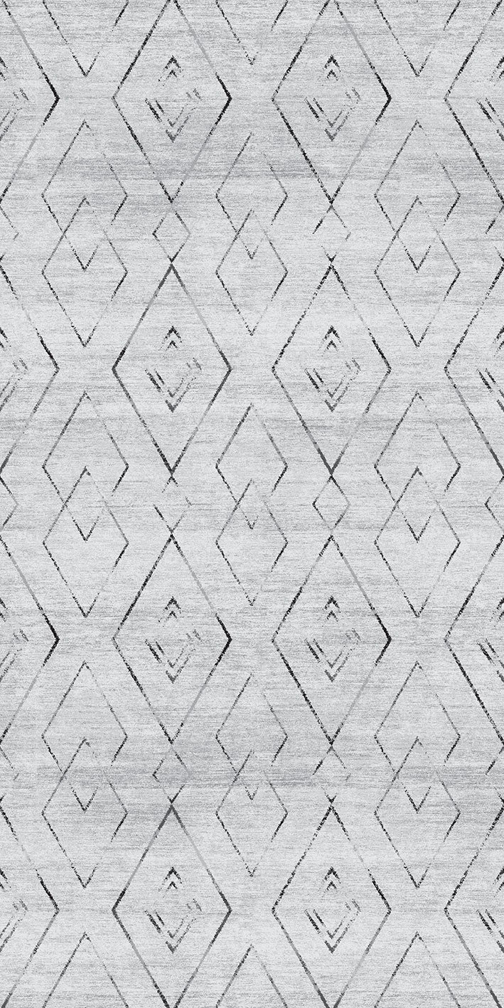 Alfombra 'Rhythm' sobre un fondo blanco, destacando su diseño geométrico con diamantes entrelazados. Los colores neutros la hacen versátil para cualquier decoración, y es lavable en lavadora para un mantenimiento práctico.