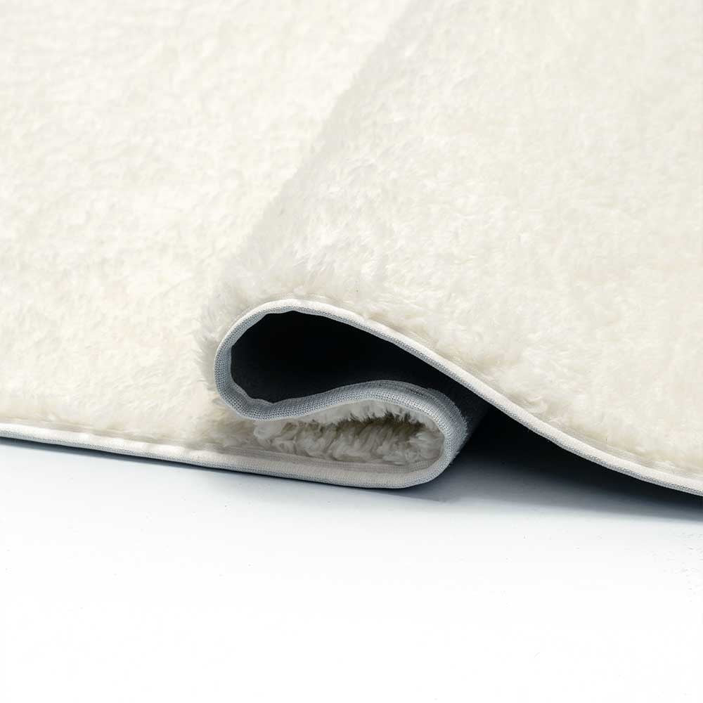 Tapis à poils longs beige