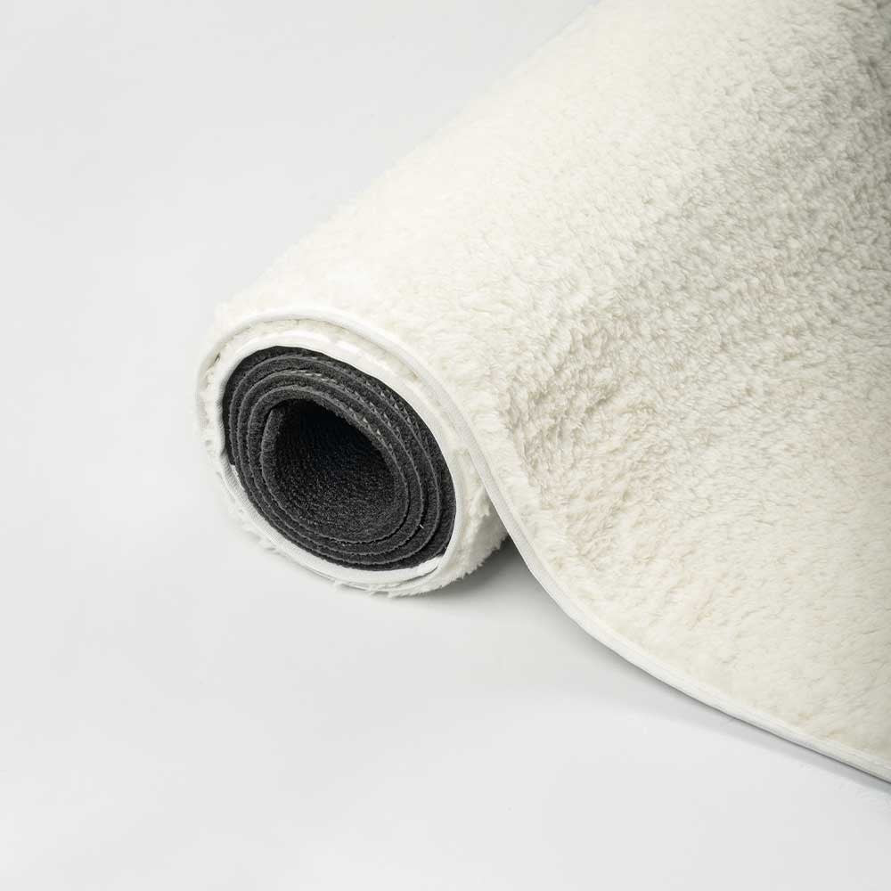 Tapis à poils longs beige