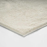 Tapis à poils longs beige