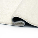 Tapis à poils longs beige