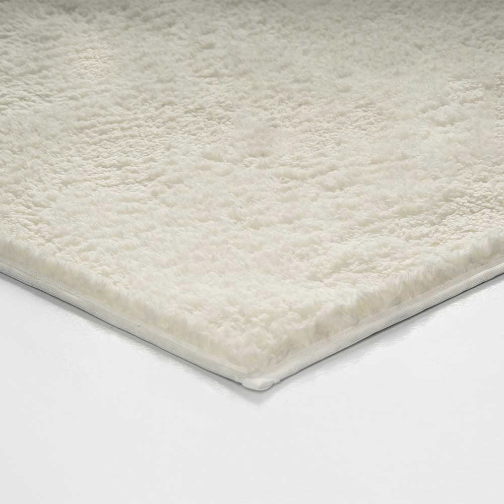 Tapis à poils longs beige
